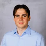 a head shot of Alex Bowker