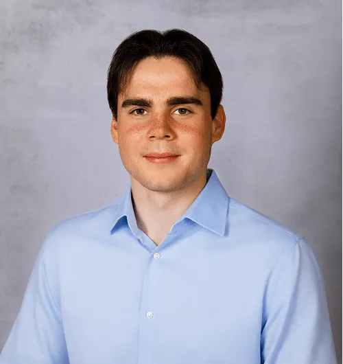 a head shot of Alex Bowker