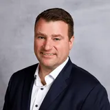 a head shot of Alex Zarycki