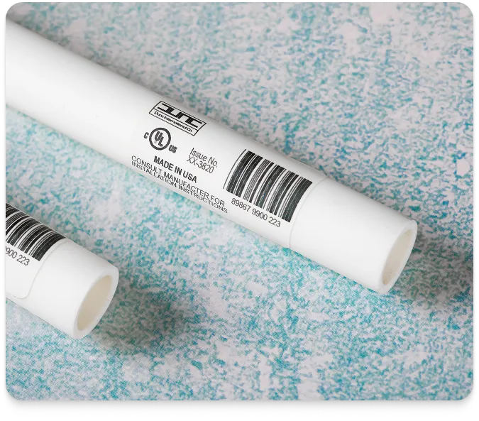 white pvc piping with a barcode label attached at its bottom