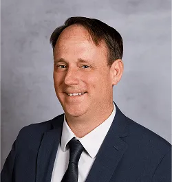 a head shot of Dan Boland