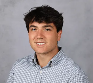 a head shot of Dominic Rosson