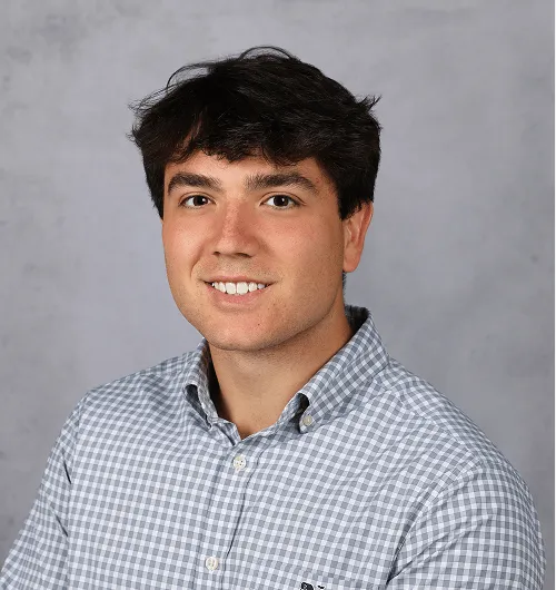 a head shot of Dominic Rosson