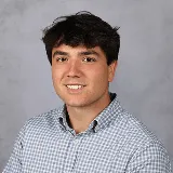 a head shot of Dominic Rosson