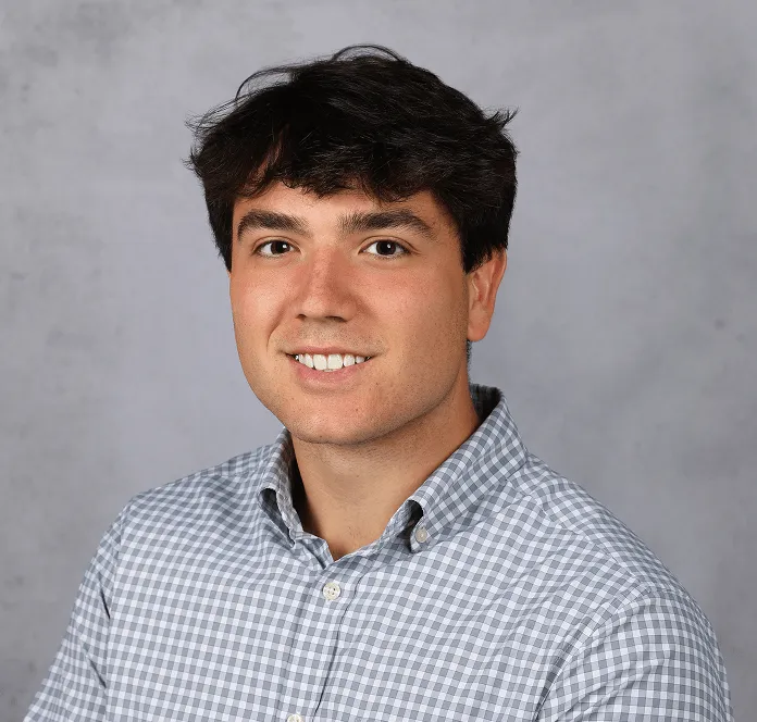 a head shot of Dominic Rosson