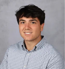 a head shot of Dominic Rosson