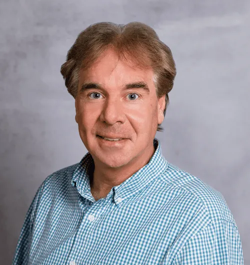 a head shot of Ed Griger