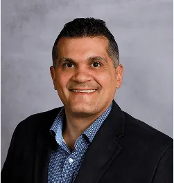 a head shot of Eric DePhillips