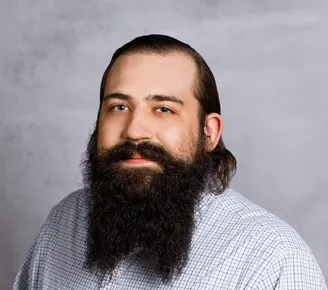 a head shot of John Swearingen