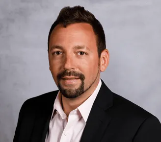 a head shot of Jonathan Schauer