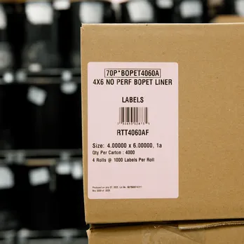 Industrial manufacturing equipment with safety compliance label attached to machinery