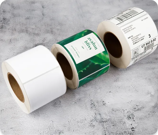 three rolls of 4 x 6 labels sitting next to eachother including thermal labels and inkjet lables