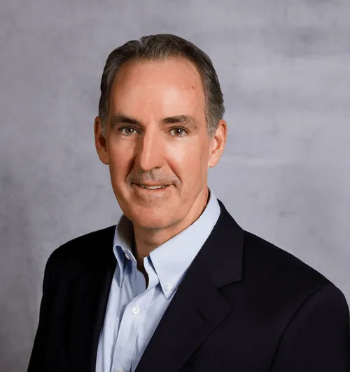 a head shot of Peter Sullivan