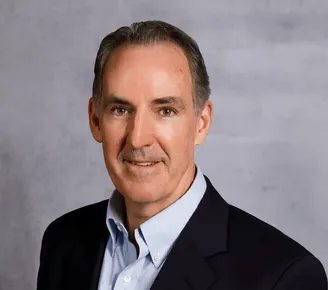 a head shot of Peter Sullivan