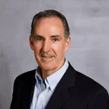 a head shot of Peter Sullivan