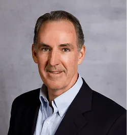 a head shot of Peter Sullivan