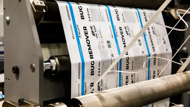 Digital printing press producing colorful custom labels