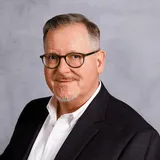 a head shot of Stuart Reid