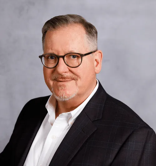 a head shot of Stuart Reid