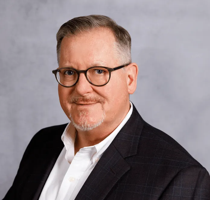 a head shot of Stuart Reid
