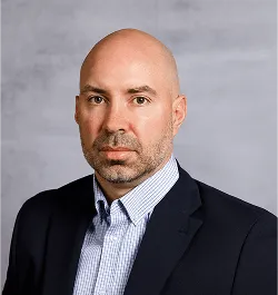 a head shot of TJ Kwasniak