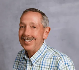 a head shot of Tom Gundling