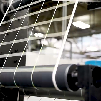 a montage of labels being printed and packaged in a factory